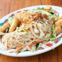 Wok Vermicelli (BúN XàO) · Protein with vermicelli noodles, bean sprout, carrots, broccoli, cabbage. Garnished with ses...