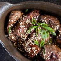 Filet Mignon Steak Strips · teriyaki glaze, sesame seeds, green onions