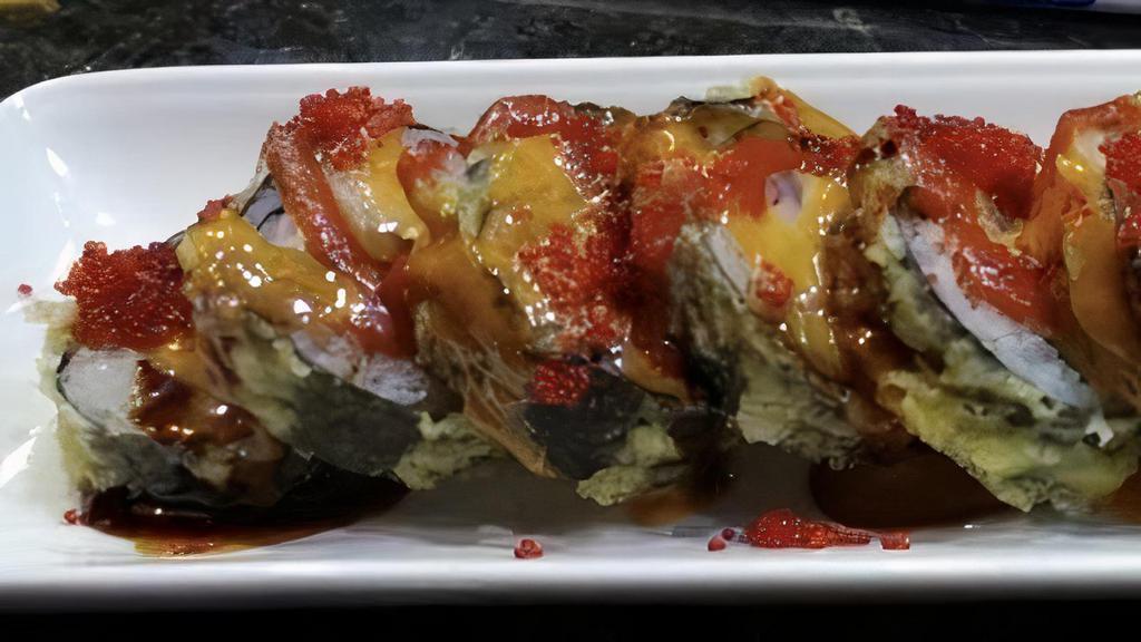 Volcano Roll · (8)Pieces with white tuna,crab meat and avocado. Than it’s deep fried in maki tempura. Served with eel sauce, spicy mayo, chili sauce and masago