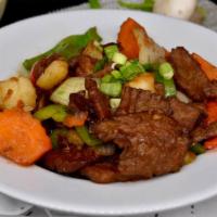 Thaisian Stir-Fried Beef Steak · Crispy sirloin beef steak, potatoes, carrots, and onions stir-fried in Thaisian home-style s...