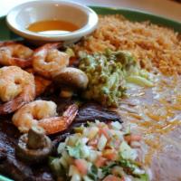 Caramba Plate · Carne asada and grilled boneless chicken breast marinated with citrus juice. Includes four p...