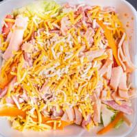 Julienne Salad · Tossed greens, turkey, ham, tomatoes, carrots and cheese with 1 large ranch.