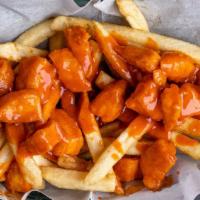 A. Chop Fries · Chopped boneless wings mixed in your choice of sauce served on top of fries