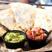 Quesadilla · Cheesy goodness inside our delicious tortilla with all the fresh add-ins you've come to expe...