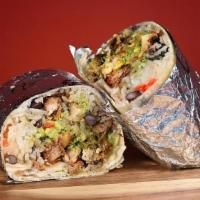 Grilled Chicken Pesto Burrito · This burrito is a DoorDash exclusive that comes on a flour tortilla with cilantro-lime white...