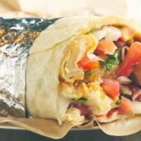 Baja Fish Burrito · Pete's famous fish burrito - comes standard with cabbage, salsa fresca, baja sauce and a squ...