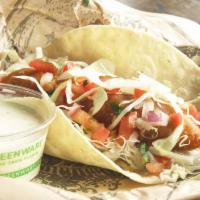 Baja Fish Taco · Our fish tacos are made with beer-battered Alaskan Pollock and served in corn tortillas with...
