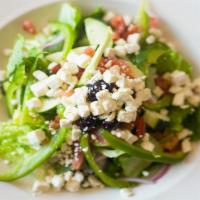 Greek Salad · Chopped romaine tossed with tomatoes, cucumbers, red onions, peppers, kalamata olives, feta ...