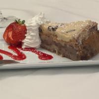 Strawberry Cannoli Cream Cake · Chilled, creamy strawberry cake frosted with Cannoli Cream.