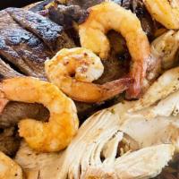 Fajitas Mix · grilled steak, chicken and shrimps, rice, beans and tortillas of your choice