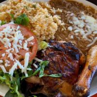 Chicken Plate · Two pieces of chicken with green salad , rice, beans and tortillas of your choice