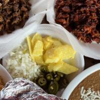 Two Pounds Meat Family Meal · One pound of Carne Asada and One Pound of Al Pastor (marinated pork ) or Carnitas (shredded ...