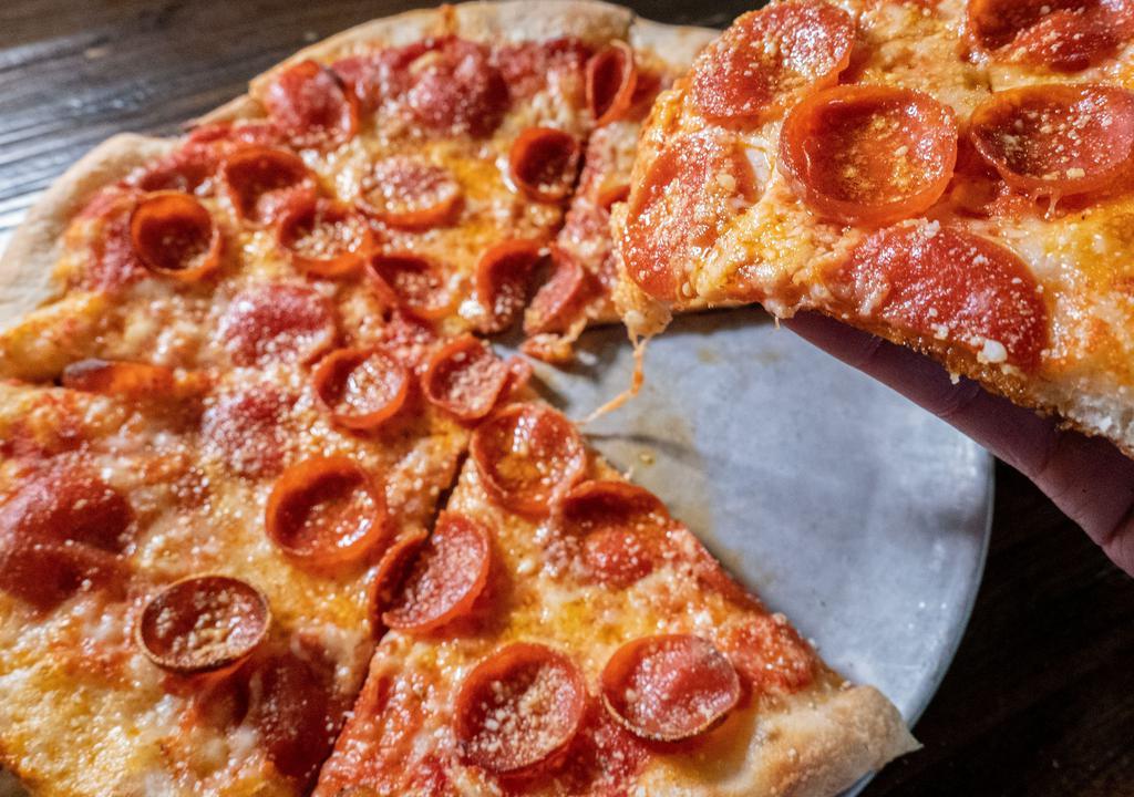 Pepperoni Pizza · Pepperoni, Tomato Sauce, Mozzarella, and Parmesan.