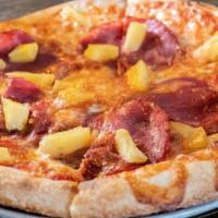 Hawaiian Pizza · Capicola, Smoked Pineapple, Tomato Sauce, and Mozzarella.