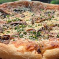 Shroom Pie · King Trumpets and Crimini Mushrooms, Mozzarella, Caramelized Onion + Herbs