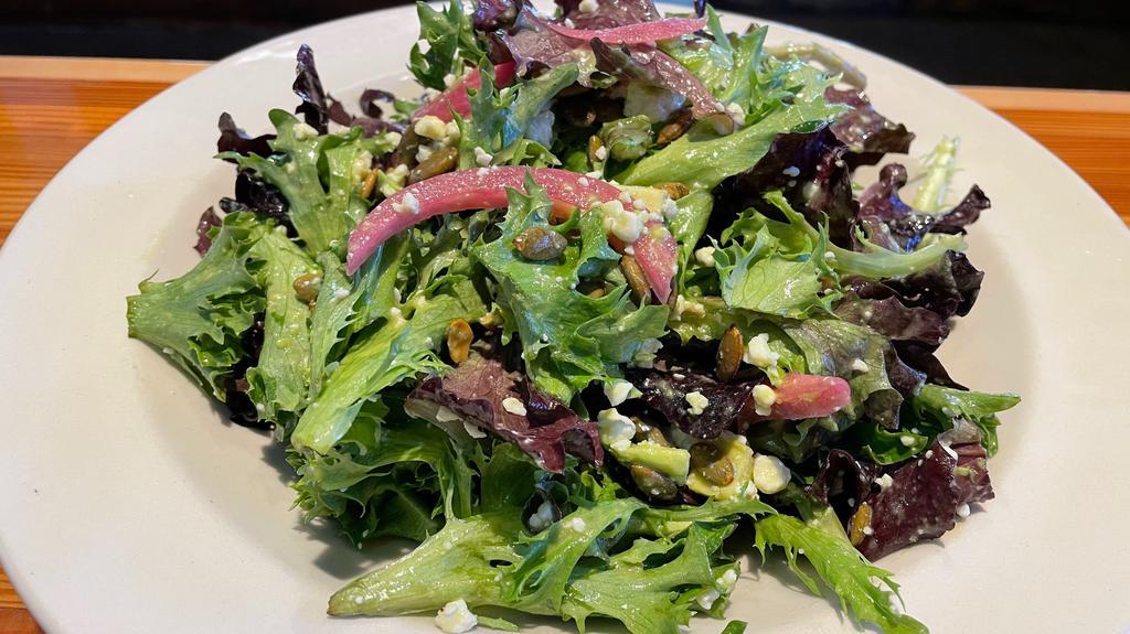 Veb Haus Salad (V, Gf) · Mixed Greens, Avocado, Pickled Red Onions, Cotija Cheese, and Pumpkin Seeds with Cilantro Lime Vinaigrette.