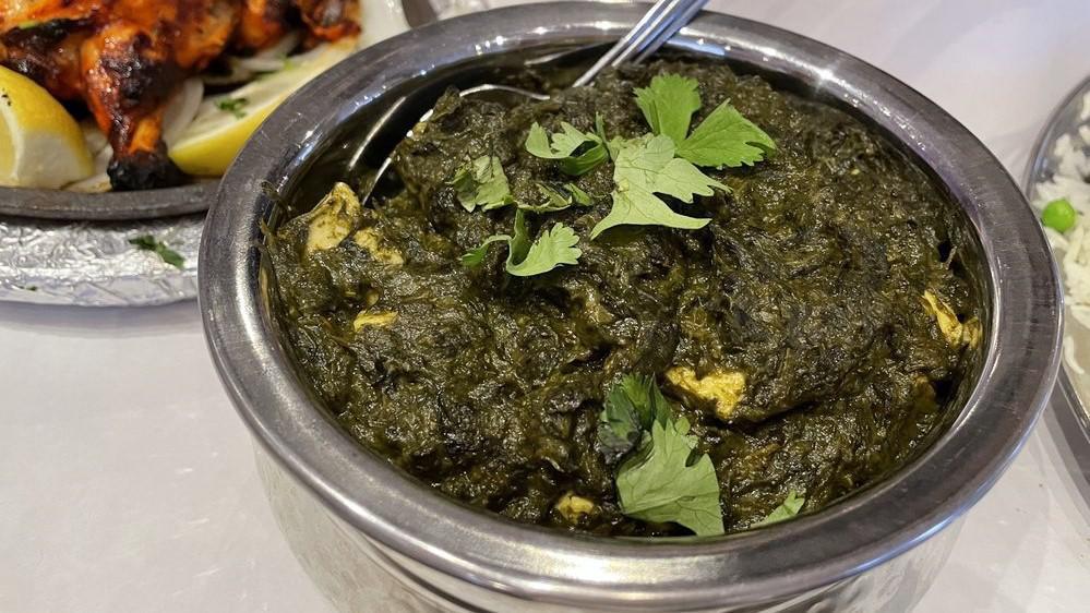 Saag Paneer · Spinach cooked with home-made cottage cheese with a touch of cream.