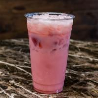 Strawberry Horchata · Agua de horchata and fresh strawberries. Contains milk and cinnamon.