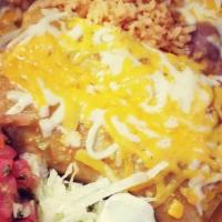 1 Dozen Enchiladas · One dozen enchiladas beef or chicken or cheese wet green or red with garnish.