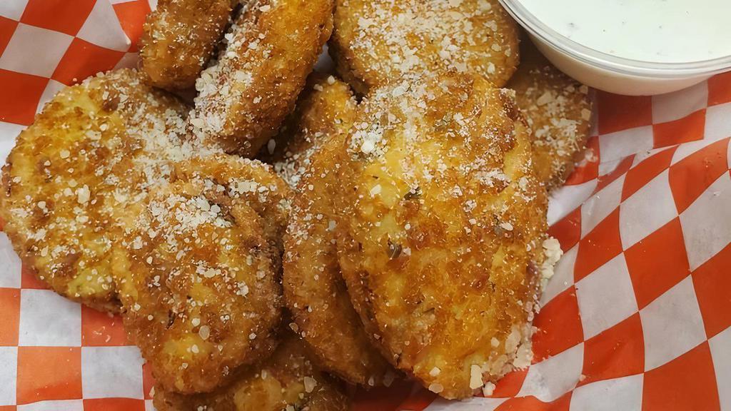 Fried Zucchini · Breaded and fried zucchini chips with a side of homemade ranch dressing