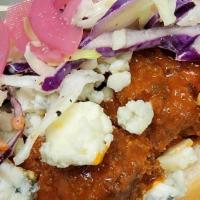 Buffalo Chicken · Grilled chicken thighs smothered in house butter Buffalo sauce, with your choice of bleu che...