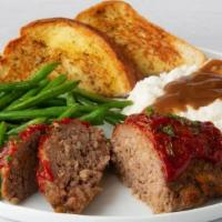 All-American Meatloaf · Glazed with ketchup and served with mashed potatoes and gravy and Texas toast.