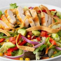 Southwest Salad · Grilled chicken, southwest veggies, corn, avocado, tomato and tortilla strips on mixed green...