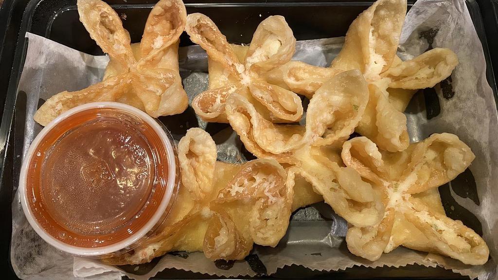 Cream Cheese Wonton (6) · Fried wontons stuffed with cream cheese and crab meat.