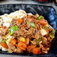 West Land Lamb Noodle · Westland noodles served in Westland sauce with cabbage, tomatoes and onions.