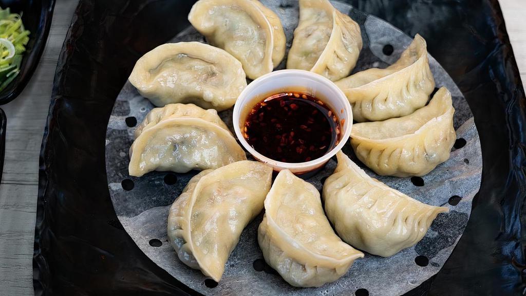 Beef Pot-Sticker (8) · Long shaped dumpling filled with chopped, seasoned onions and ground beef.