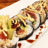 Dragon Roll · Baked unagi, spicy tuna, kiware sauce, cucumber, mango with shiso. Topped with mae ploy aiol...