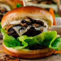 Mushroom Swiss Burger W/Rosemary Shoestring Fries--Medium  Meal · These ready-to-cook burgers serve 2-3 people. Juicy beef patty topped with sautéed mushrooms...