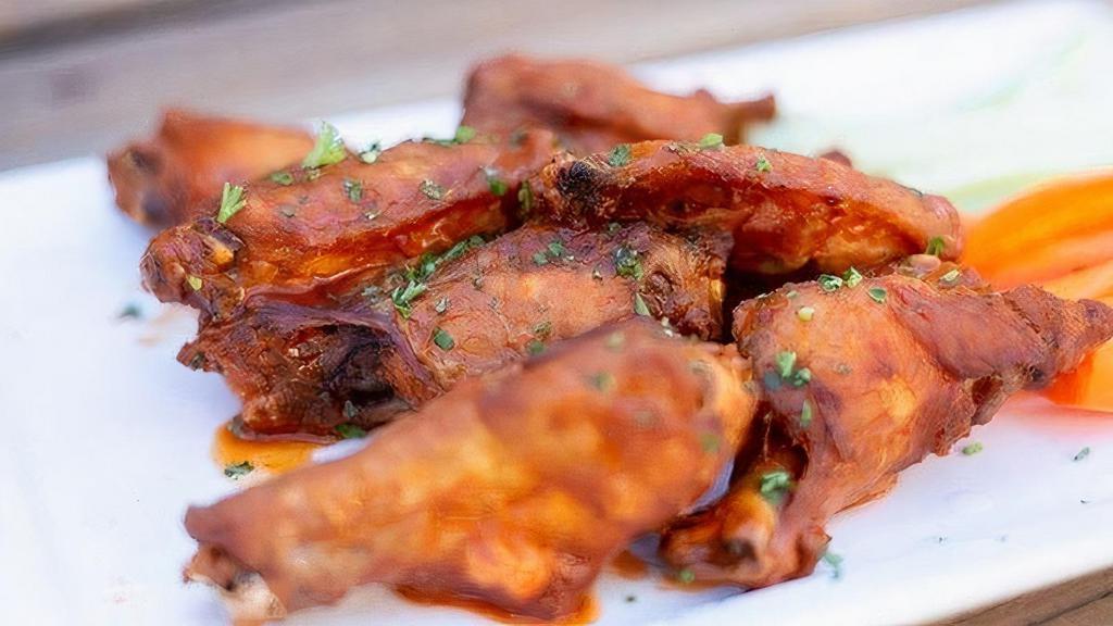 Smoked Chicken Wings · Jumbo Wings Tossed in Choice of Sauce- Buffalo, BBQ, Lemon Pepper, Sweet Thai Chili, or Fire Sauce.. + Celery + Carrots + Ranch