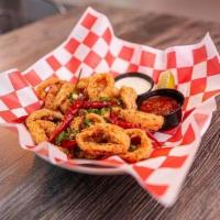 Calamari · Flash-Fried Calamari Rings Tossed in Pickled Peppers + Green Onions + Red Calabrian Chiles S...