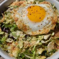 Shredded Brussels Sprouts Caesar Salad · Mixed Greens, Parmesan Croutons, Sunny Egg