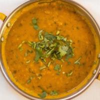 Daal Tadka · Mixed lentils cooked with fresh herbs and spices, sauteed in butter and garnished with fresh...