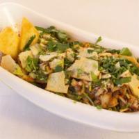 Papdi Chaat · Crisp fried dough wafers known as papdi, along with boiled chick peas, boiled potatoes, yogu...
