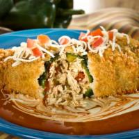 Chicken Poblano · Spicy. Lightly breaded poblano Chile stuffed with shredded chicken, served with baja sauce, ...