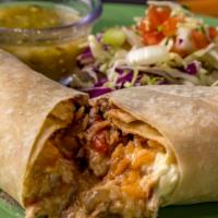 Pollo Blanco Burro · Shredded chicken, rice, black beans & baja sauce wrapped in a flour tortilla. Served with fi...