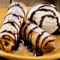 Mini Chocolate Chimis · Crispy tortillas chocolate sauce and vanilla ice cream.