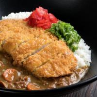 Katsu Curry Rice · A generous portion of house-made smooth Japanese Curry over a bed of fluffy rice served with...