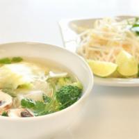 Veggie Pho · Real veggie broth and pho noodles served with fried tofu, cabbage, broccoli, mushroom. A sid...