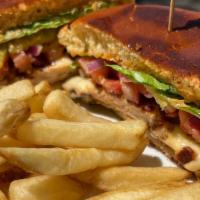 Chipotle Chicken Club · Grilled chicken served on a chipotle aioli grilled brioche bun piled high with bacon, lettuc...