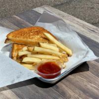 Kids Grilled Cheese Sandwich · Served with one side.