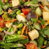 Vegan Side Garden Salad · Spring Mix, Cucumber, Tomato, Red Onion, Carrot, Edamame, Croutons, Choice of Dressing