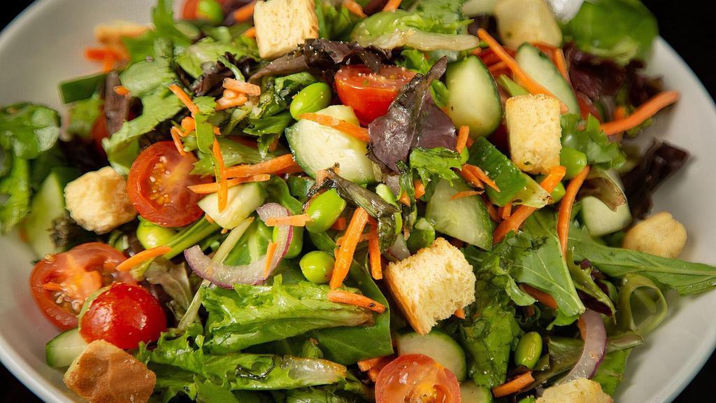 Vegan Side Garden Salad · Spring Mix, Cucumber, Tomato, Red Onion, Carrot, Edamame, Croutons, Choice of Dressing