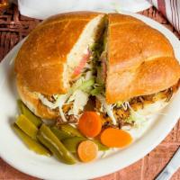Tortas (Mexican Sandwich) · Served on a telera roll. Your choice of protein with broiled cheese and garnished with cabba...