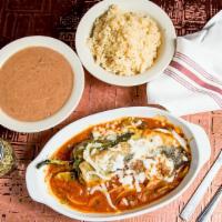 Poblano Relleno De Papa & Queso Platter · A Roasted Poblano Chile Stuffed with Potato and Queso Fresco Mexicano, drenched in a Savory ...