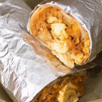 Breakfast Burrito · Cage-free eggs, refried pinto beans, potatoes, chorizo, Green Chile Queso and shredded mixed...