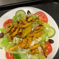 #36. Chicken Shawarma Salad · Thinly sliced chicken shawarma served on top of lettuce, tomatoes, cucumbers, onions, olives...